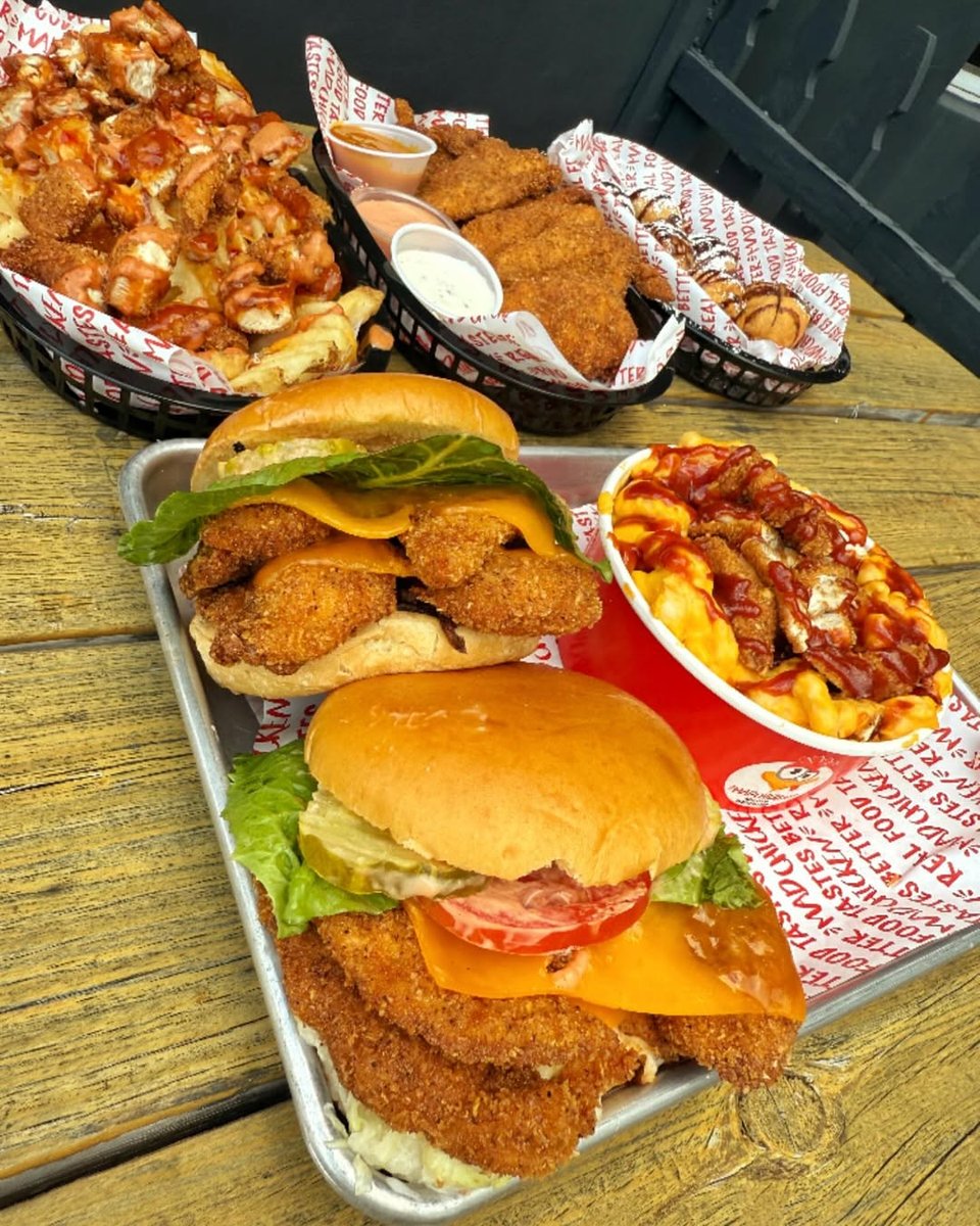 Sandwiches, tenders and boxes on a tray