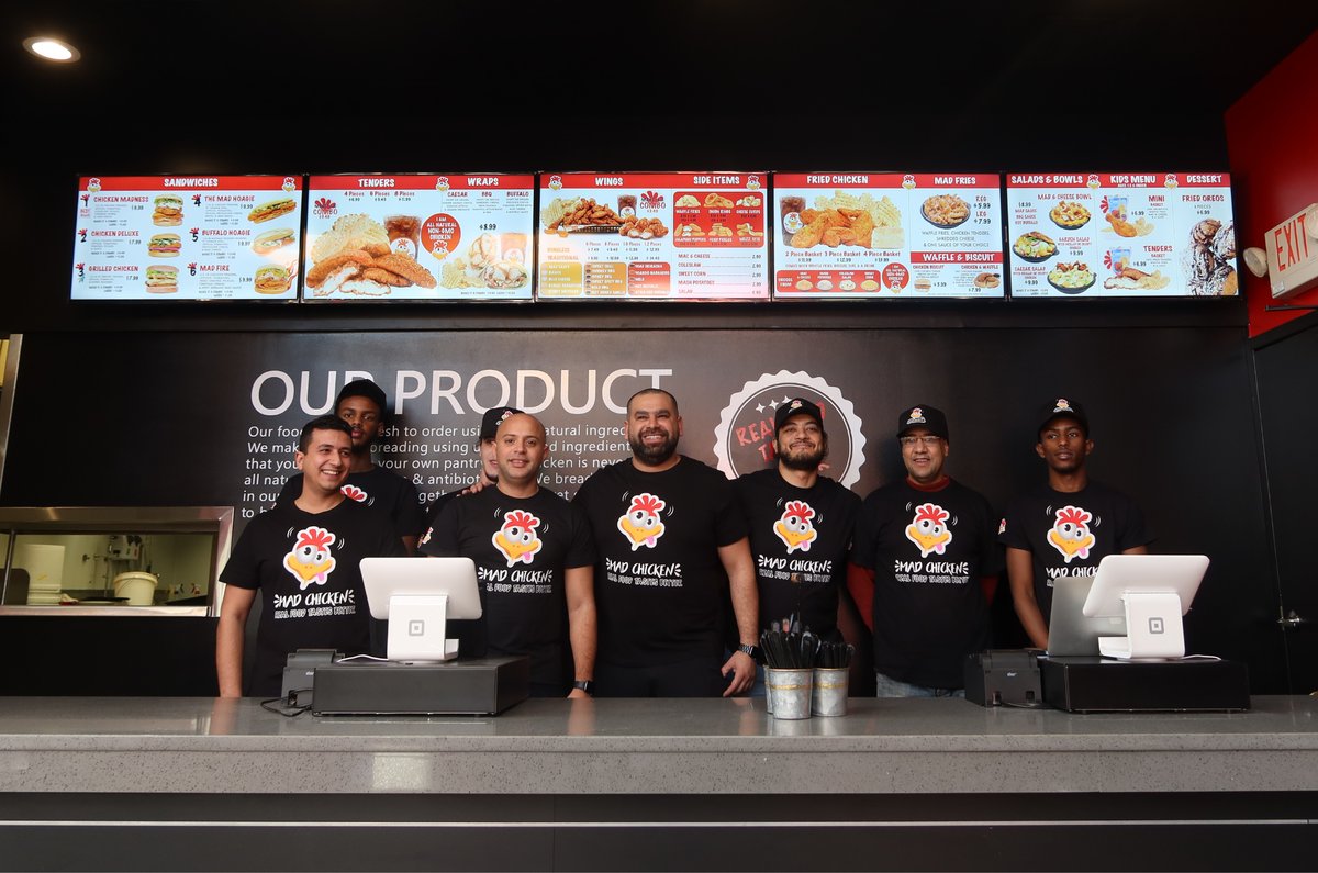 Mad Chicken team behind the counter